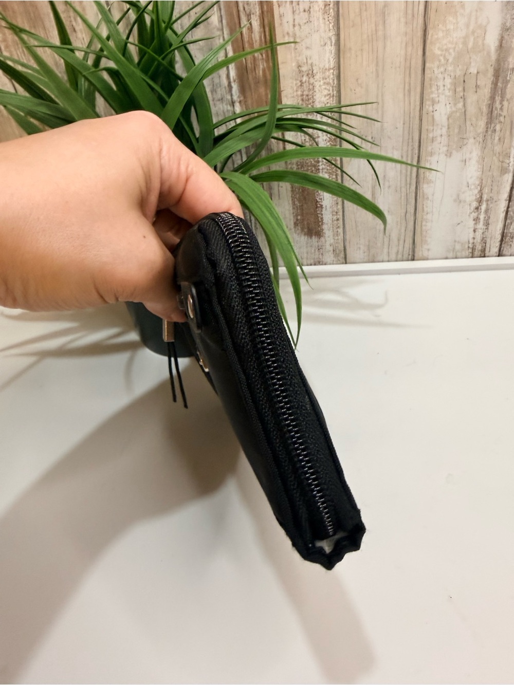 Baggallini Zip Around Wallet featuring a wrist strap and RFID protection, Black - Picture 5 of 8